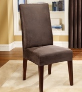 Get the luxe look of leather with the convenience of a snug, custom fit with this stretch slipcover from Sure Fit. Featuring supple imitation leather that easily fits most dining room chairs.