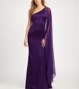 Luxurious silk in an asymmetrical silhouette, accented with a single floor-length chiffon sleeve and a jeweled shoulder detail.Asymmetrical necklineBeaded shoulder detailSingle long chiffon sleeve with floor-length drapeConcealed back zipSilk liningAbout 45 from natural waistSilkDry cleanImportedModel shown is 5'10 (177cm) wearing US size 4. 