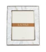 Enhance the look of any photo when framed in the beauty of Mother of Pearl. A slim line of carved steel trim surrounds this natural composition with classic style, only from Lauren by Ralph Lauren.