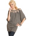 Triangular cutouts and a slouchy-chic fit make Jessica Simpson's metallic-flecked sweater tunic totally sparkle.