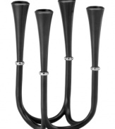Bring a little old-fashioned drama to the table with the modern Crown candelabra from Dansk. Sleek candlesticks flow together in dark aluminum with polished silvertone accents.