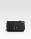 Shimmering crystal-encrusted suede in a shapely foldover bag.Chain shoulder strap, 11 dropFlap with turnlock closureOne inside open pocketSuede lining9W X 6¾H X 1DImported