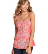 Take on the summery temps in this printed tank from Rampage! The side cutouts and sleeveless design promote sun-kissed skin!