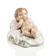 Create a beautiful nativity scene around the baby Jesus figurine from Nao by Lladro. Handcrafted porcelain is delicately glazed and sure to be cherished at every Christmas to come.