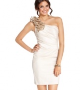 A grand, sequin ruffle makes for a gorgeous centerpiece on this chic LWD -- little white dress! From Hailey Logan.