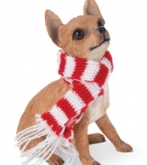 A fetching gift for animal lovers, the Chihuahua Christmas ornament depicts the pint-sized pup waiting patiently for treats and dressed in a holiday scarf. From Sandicast.