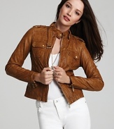 Get ahead of the sartorial curve in this structured MICHAEL Michael Kors leather jacket, accented with bullish gold hardware for downtown edge. Showcase the style against crisp white separates.