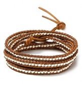 Nod to natural influences with this brown leather wrap bracelet from Chan Luu. With sterling silver accents, it's a cool combination of tone and texture.
