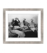 Put your home on a nautical course. A little old-fashioned fun on the water, the Yachting art print captures four elegant women gazing back toward the shoreline. With a simple wooden frame from Lauren Ralph Lauren.