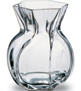 A vase crafted with such clarity and fluidity that is seems you could reach right through it's splendid form. This handmade vase is a fine example of the excellence in glassmaking that Baccarat has upheld for over 200 years.