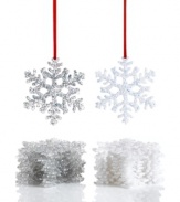Let it snow. A flurry of glitter, these Holiday Lane snowflake ornaments turn your home into a beautiful winter wonderland.