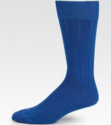 Remarkably soft cashmere blend with a subtle ribbing effect.Mid-calf height60% cashmere/26% silk/14% nylonHand washMade in Italy