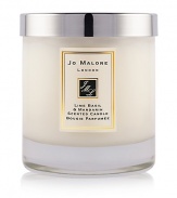 Reminiscent of the scent of limes carried on a Caribbean Sea breeze, this unisex scent combines fresh limes with mandarin, peppery basil and aromatic white thyme. Lime Basil & Mandarin Home Candle infuses any room with an evocative scent that lasts for hours. Lid included. 7 oz. 