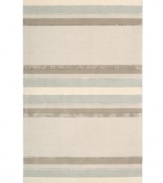 Linear designs are accented with exotic faux silk to create a timeless palette in the Sahara area rug from Calvin Klein. Crafted by skilled artisans in India, it features generously thick wool and viscose fibers woven to create remarkable strength and impeccable elegance.