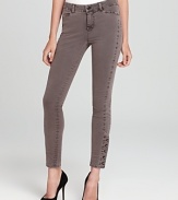 Make a military-inspired statement in these J Brand skinny jeans with button embellishments at the ankles for authentic appeal. Dress the look up with pumps or rock downtown cool with booties.
