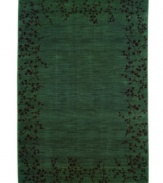 Latticed with vinery in deep maroon tones on a blue-green ground, this elegant transitional rug brings beauty to any room in your home. Cross-woven in resilient nylon for a luxuriously soft feel and long-lasting allure.