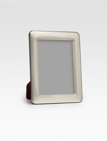 A picture-perfect tabletop design from Barcelona's famed silversmiths, crafted with heirloom detail and rounded corners in gleaming sterling silver. Accommodates a 4 X 6 photograph Made in Spain 