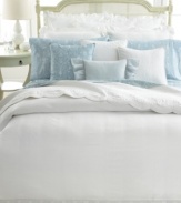 Luxurious white-on-white quilted details lend sumptuous texture to this Spring Hill quilt from Lauren by Ralph Lauren. Finished with scalloped edges. Reverses to solid.