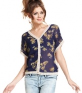 Two looks in one! Sporting open-knit design on one side and floral-print chiffon on the other, Jessica Simpson's reversible sweater is all about the chicest options.