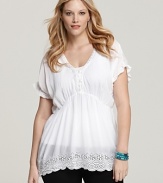 A dressed-up version of the classic white tee, this Johnny Was Collection Plus tunic boasts flirty eyelet trim and a flattering A-line silhouette for a feminine take on the closet staple.