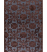 Lose yourself in the spellbinding look and unbelievably plush feel of Couristan's Pave Bezel Medallion rug. Woven of a luxe blend of viscose, silk and chenille for one-of-a-kind texture and high-low carved effect, the medallion-patterned rug is rendered in rich chestnut and lapis hues to add high style to any room.