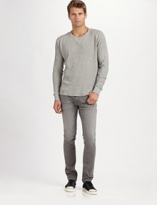 A slightly-slim version of the classic straight-leg fit, cut from premium Japanese denim with hand-applied distressed detail at the points of wear. Five-pocket style Leather logo patch on back waist Inseam, about 34 Cotton/spandex Machine wash Made in USA 