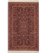 Richly detailed and deeply colored, the exotic floral motif of this rug made its debut in twentieth-century America and has remained a favorite. Individual skein-dyeing imparts a jewel-tone clarity to the rich red, green and ivory palette. A patented wash process creates a soft vintage finish faithful to the craftsmanship of the original. Woven in the USA of premium fully worsted New Zealand wool.