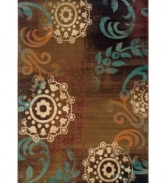 A little floral whimsy meets the vivid layering of color in this contemporary Gramercy area rug from Sphinx. Crafted of tough polypropylene for natural durability and effortless softness underfoot. (Clearance)