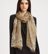 A glamourous design featuring luxurious cashmere with a chic leopard and poppy print. CashmereAbout 27½ X 78¾Dry cleanMade in Italy