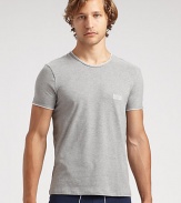 A menswear basic that transcends seasons and eras, shaped in a fine cotton knit touched with generous stretch. Crewneck 94% cotton/6% elastane; machine wash Imported 
