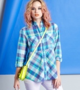 Fire updates the classic plaid button-down top with a soft-hued palette and empire-waist design.