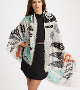 A graphic printed style with a foiled dot overlay in a wool and silk blend. 71% wool/29% silk40 X 70Dry cleanImported 