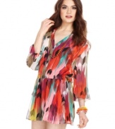 All hail American Rag for whipping up a chic look that suits poolside lounging! With it's profusion of lively color and gauzy chiffon design, this dress calls for a celebration of warm days!