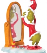 The transformation is complete! A red, fur-trimmed hat and coat are all it takes to disguise the Grinch as the bearer of gifts and good cheer. A pivotal moment in the Dr. Seuss tale, from Department 56.
