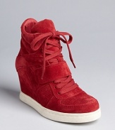 The wedge sneaker pump is back and at the height of the trends; Ash nails the look in a super cool high top style.