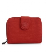 A lightweight nylon wallet from Kipling that's on the money-pair it with your favorite Kipling purse or use it on its own!