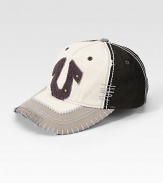A textured felt horseshoe mixes color and texture in this casual design with frayed edges. 55% linen45% cottonHand washImported