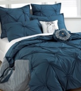 Lost at sea. Indulge in the deep blue of the Tufted Squares comforter set, featuring tufted fabric and button details for added texture and style. Two distinctive decorative pillows accessorize the set giving an artistic touch to your bed.