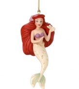An underseas treasure for your tree, this Ariel ornament evokes the classic Disney film. The little mermaid dreams she's back on land, just in time for Christmas! (Clearance)
