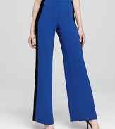 A high waist and wide leg lend sophistication to these Trina Turk pants, fashioned in statement-making blocked colors.