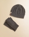 Cozy wool and cashmere knit gets chic with a check tab and ribbed detail. Ribbed bottom Check trim tab 85% wool/15% cashmere Dry clean Imported 