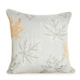 Dress up the bed with this decorative pillow. With a botanic print in a soothing palette, it makes a lovely addition to your home.