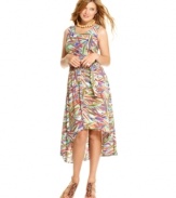 Adopt a tropical state of style with this printed, asymmetrical dress from Planet Gold! For an awesome way to upgrade the trend-right look, pair the dress with colorful wedges!