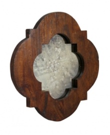 Get a better look. Perfect for a foyer or living room, this pretty wall mirror from Regina Andrew combines graceful scalloped edges in dark wood. Get a better look. Perfect for a foyer or living room, this pretty wall mirror from Regina Andrew combines graceful scalloped edges in dark wood.