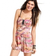 Material Girl offsets a soft print with an industrial-tough zipper on a romper that masters fun, summery style!