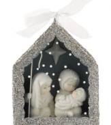 The time-honored tradition of Snowbabies brings the birth of Baby Jesus to your tree this season in this lovely ornament from Department 56. Crafted of pure porcelain bisque with sparkling silver details.