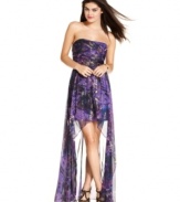 Bold and bewitching, with brushstrokes of metallic to highlight the most stunning print, this high-low style strapless gown from Jump is designed to own the night.