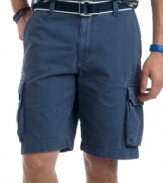 Some things never fade, like the cool casual style you'll get with these cargo shorts from Izod.