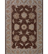 Classic sophistication takes root as flowering vines and elegant palmettes add a touch of tradition to your space. Hand tufted in densely woven polyester and acrylic, this plush area rug from Dalyn will maintain its subtle coloration and rich texture for years to come.