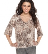 Mixed animal print makes this blouson top from American Rag a vivacious pick. Style it with metallic accessories for a casual-cute look that suits your wild life!